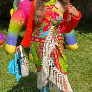 Fringe summer dress with halter neck detailing.